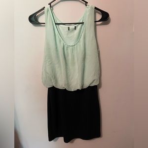 Flowy tank top with body con black dress bottom